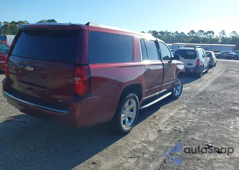 2018 Chevrolet Suburban Premier z USA, uszkodzony, nr VIN 1GNSCJKCXJR150912